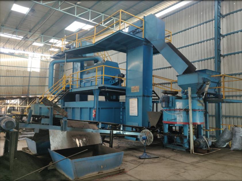 Blue sand preparation plant with bucket elevator, hopper and mixer inside the foundry